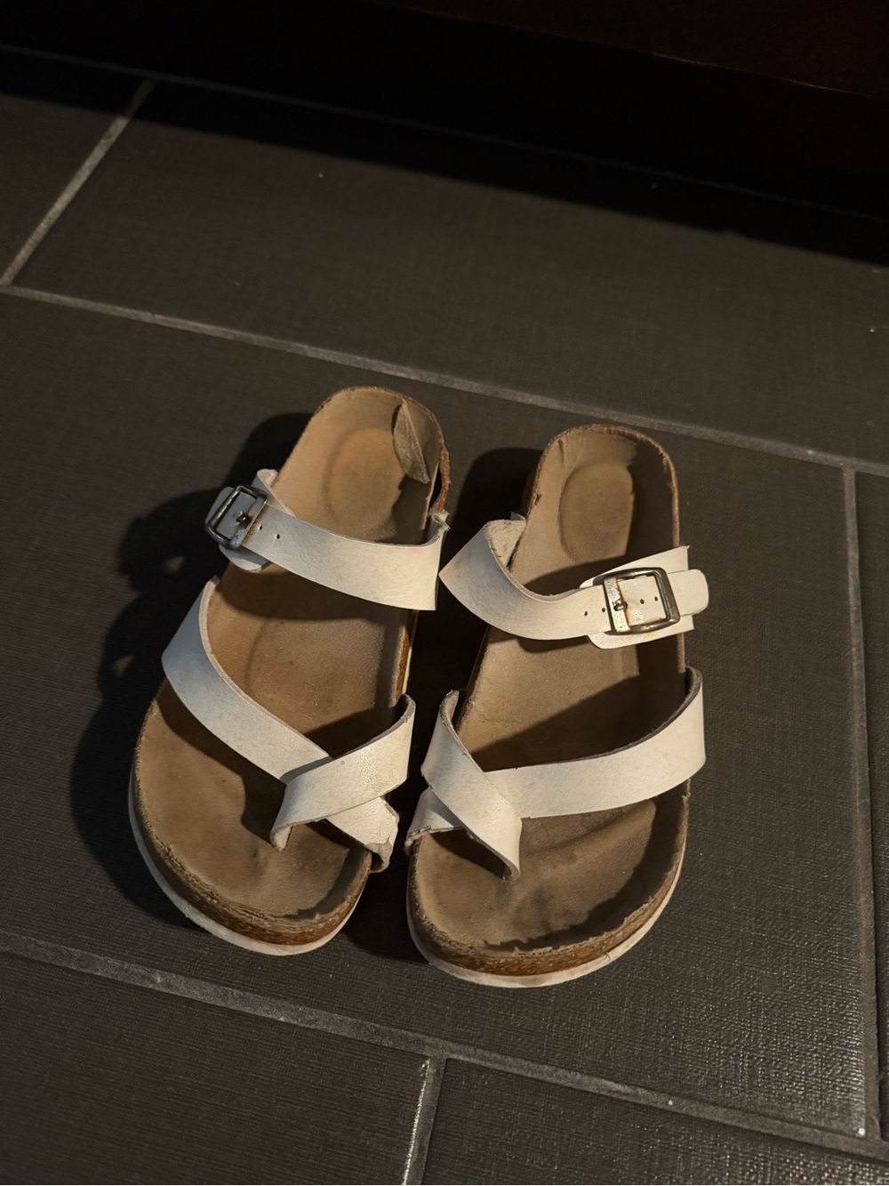 Women’s White Strappy Buckle Sandals well worn